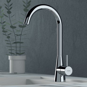 Een kraan afbeelding van een Diva chrome opbouw keukenkraan met conische voet en staafhendel op een aanrechtblad in een luxe keuken. Volg de link om naar de Keukenkranen categorie te gaan.