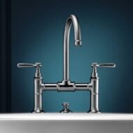 Axor Montreux retro 3-gats tweegreeps wastafelmengkraan met draaibare uitloop en afvoergarnituur 16511000